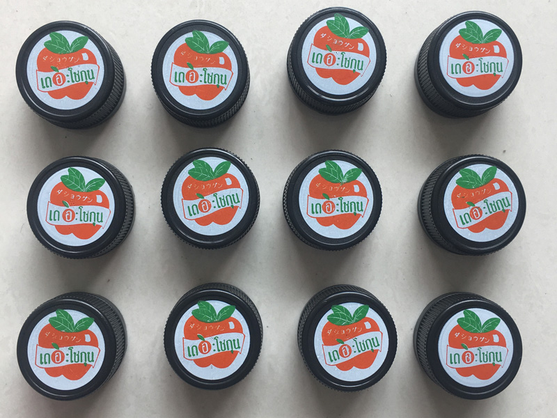 Cliente de Tailandia compra impresora automática de cuatro colores para tapas de plástico